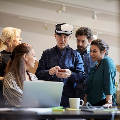 Coworkers using smart devices