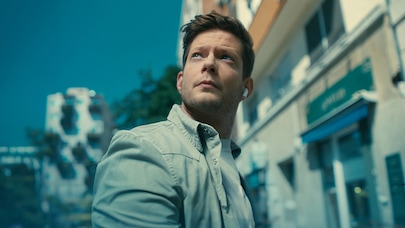 Man standing in front of a building